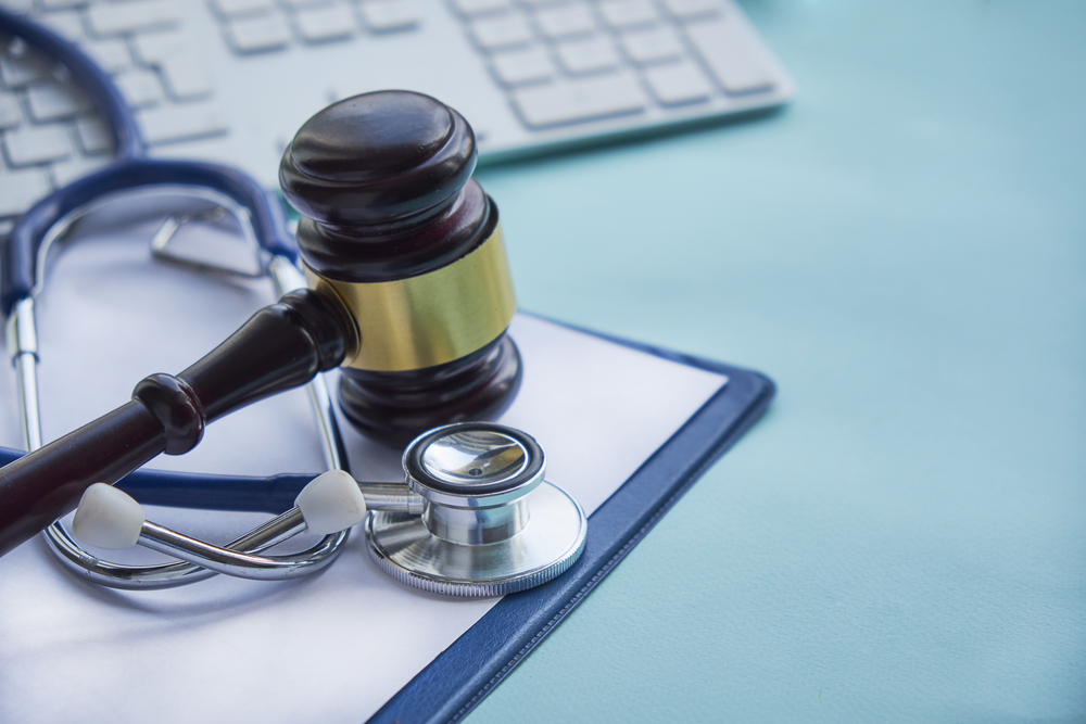 How to Avoid Becoming a Medical Malpractice Victim - Gavel and stethoscope. medical jurisprudence. legal definition of medical malpractice. attorney. common errors doctors, nurses and hospitals make.